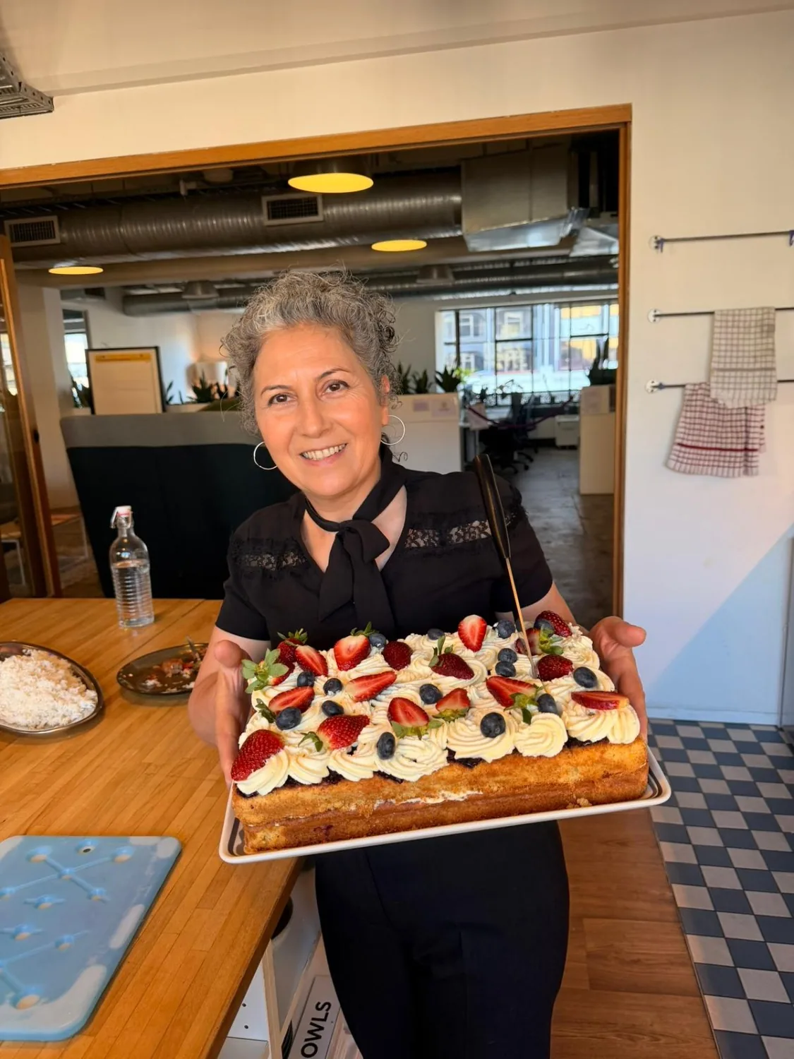 the baker with a finished cake at FoodLab